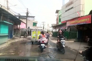 Lubang Jalan di Sei Mencirim Kini Datangkan Manfaat