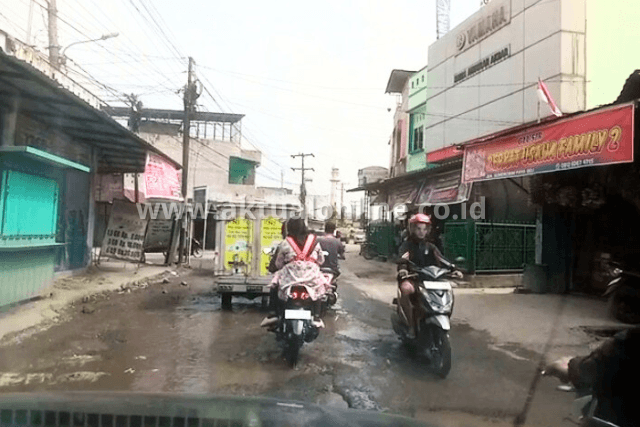 Lubang Jalan di Sei Mencirim Kini Datangkan Manfaat